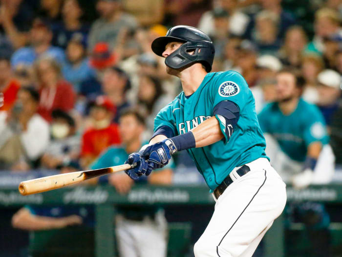 Jul 9, 2021; Seattle, Washington, USA; Seattle Mariners designated hitter Mitch Haniger (17) watches his grand slam home run against the Los Angeles Angels during the eighth inning at T-Mobile Park.